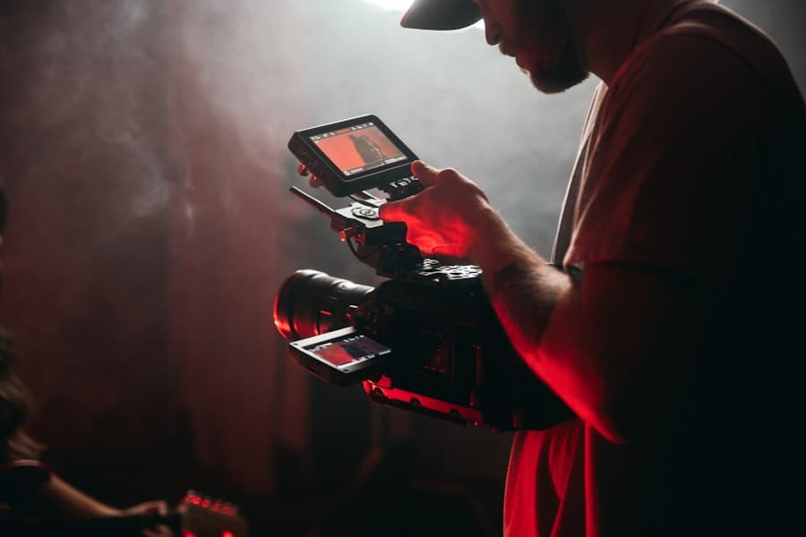 A creator on a video shoot — footage being rendered