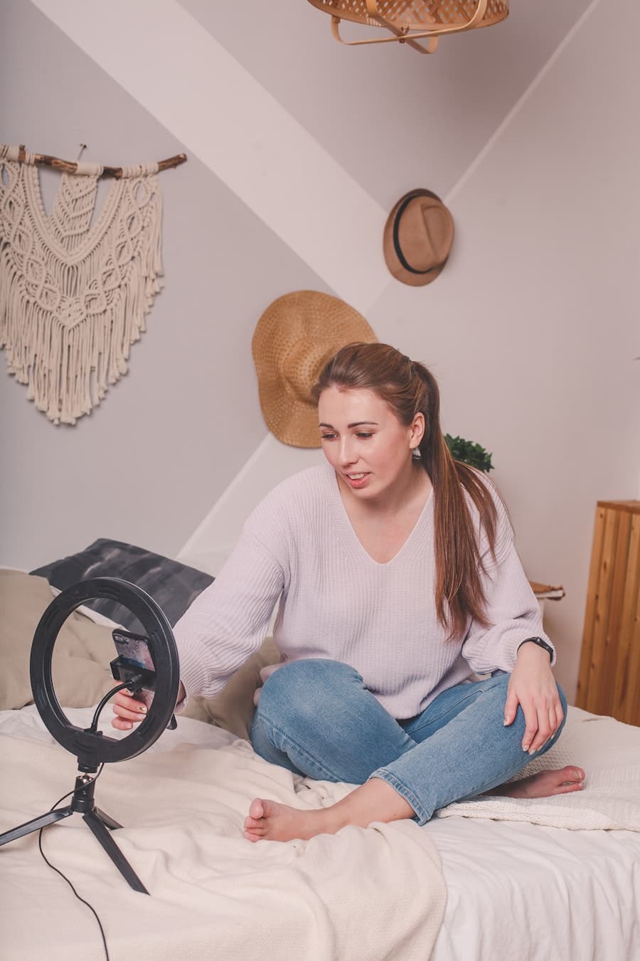 A creator filming a short-form video at home with a ring light